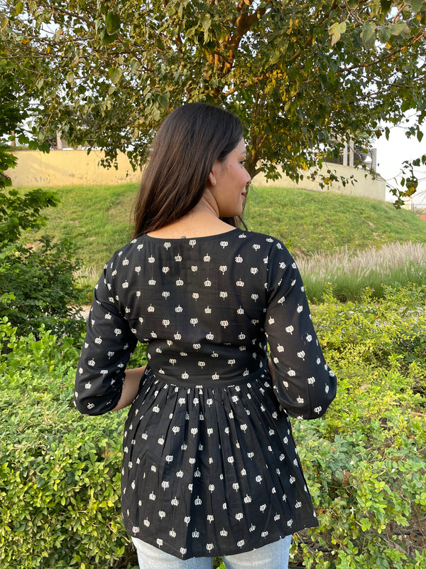 Black motif peplum top - Jonaya