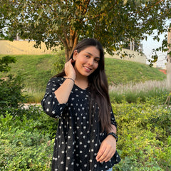 Black motif peplum top - Jonaya