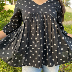 Black motif peplum top - Jonaya