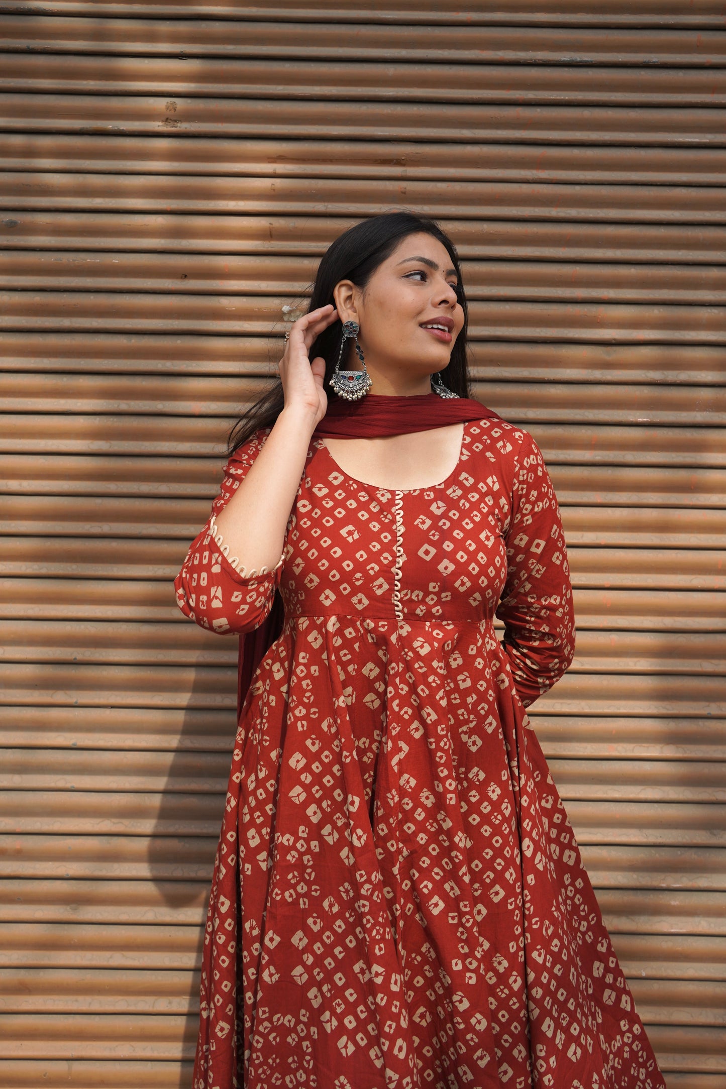 Red bandhej flared suit set